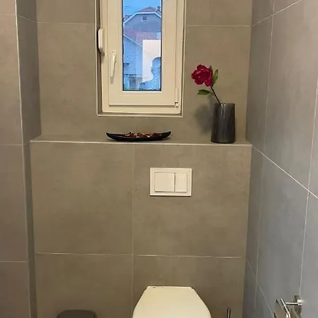 Ad *